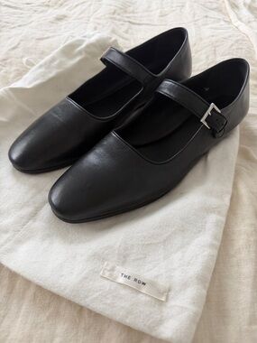 The Row Ava Black Leather Mary Jane Flats with Silver Buckle